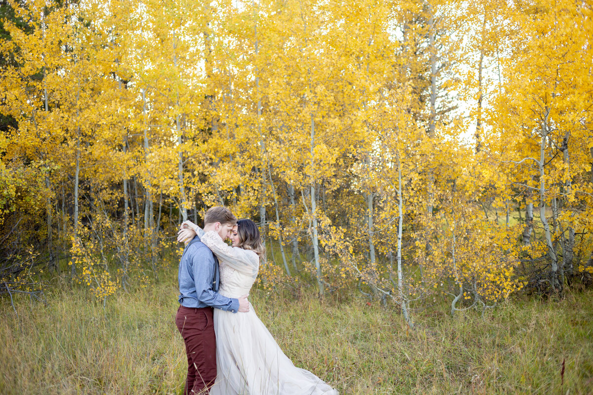 Idaho Wedding Photographer captures spring wedding with couple embracing