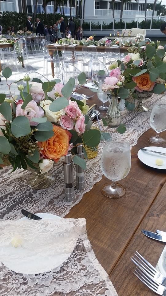 Farm table lace runner with rustic centerpieces