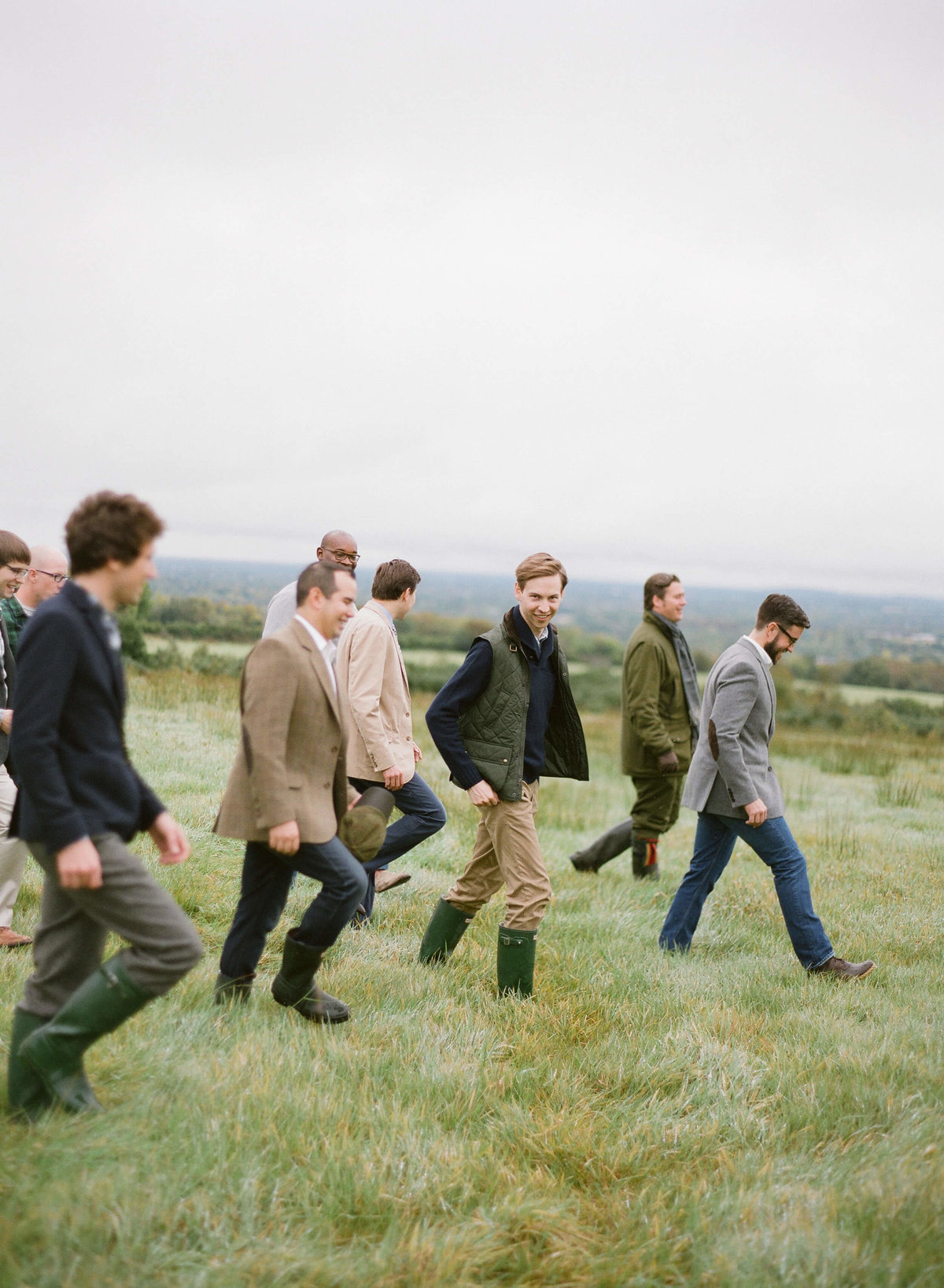 20-KTMerry-destination-weddings-groomsmen-walking-Ireland