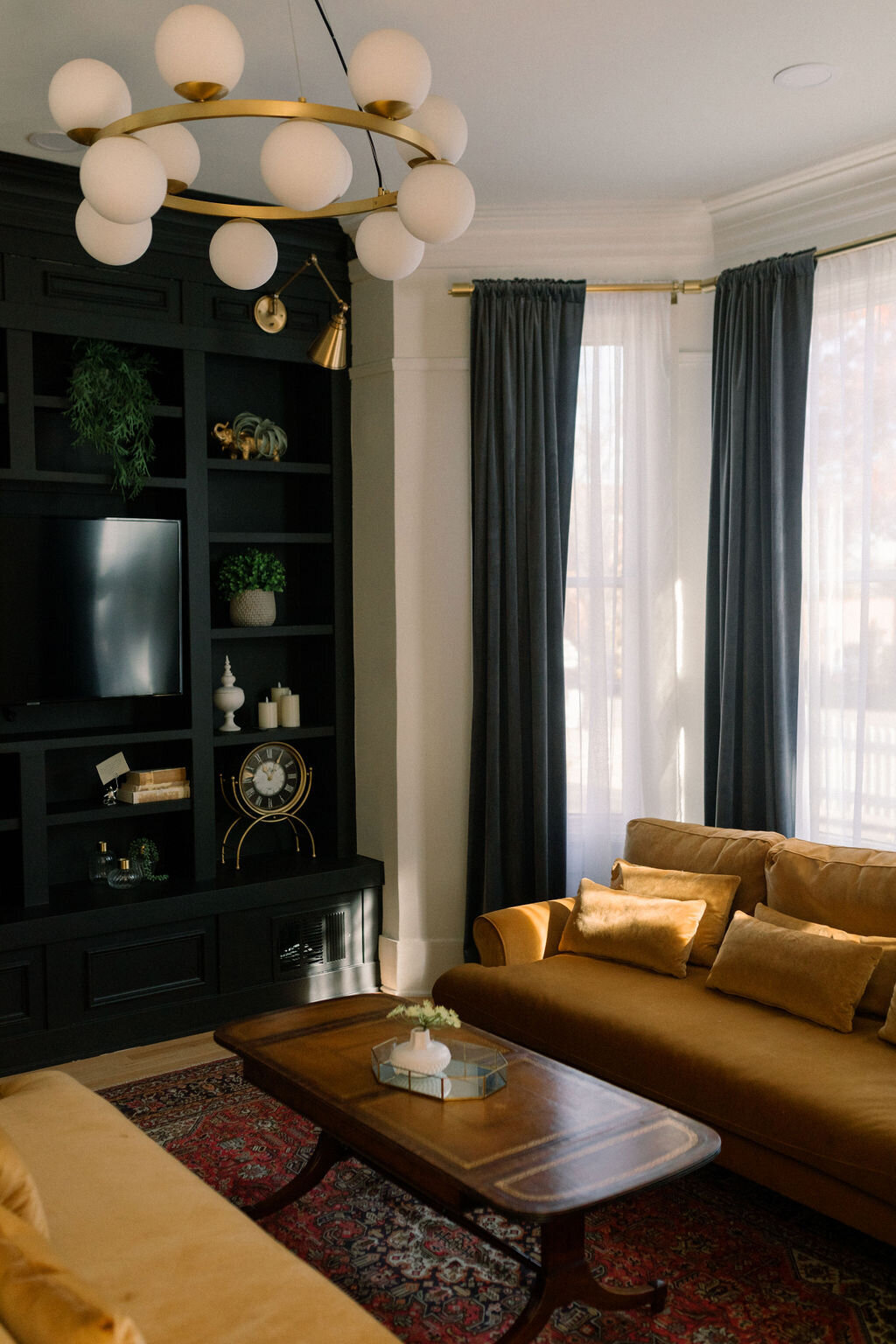 Living room with coffee table and comfy couch at at the Terry Guesthouse in Longmont Colorado