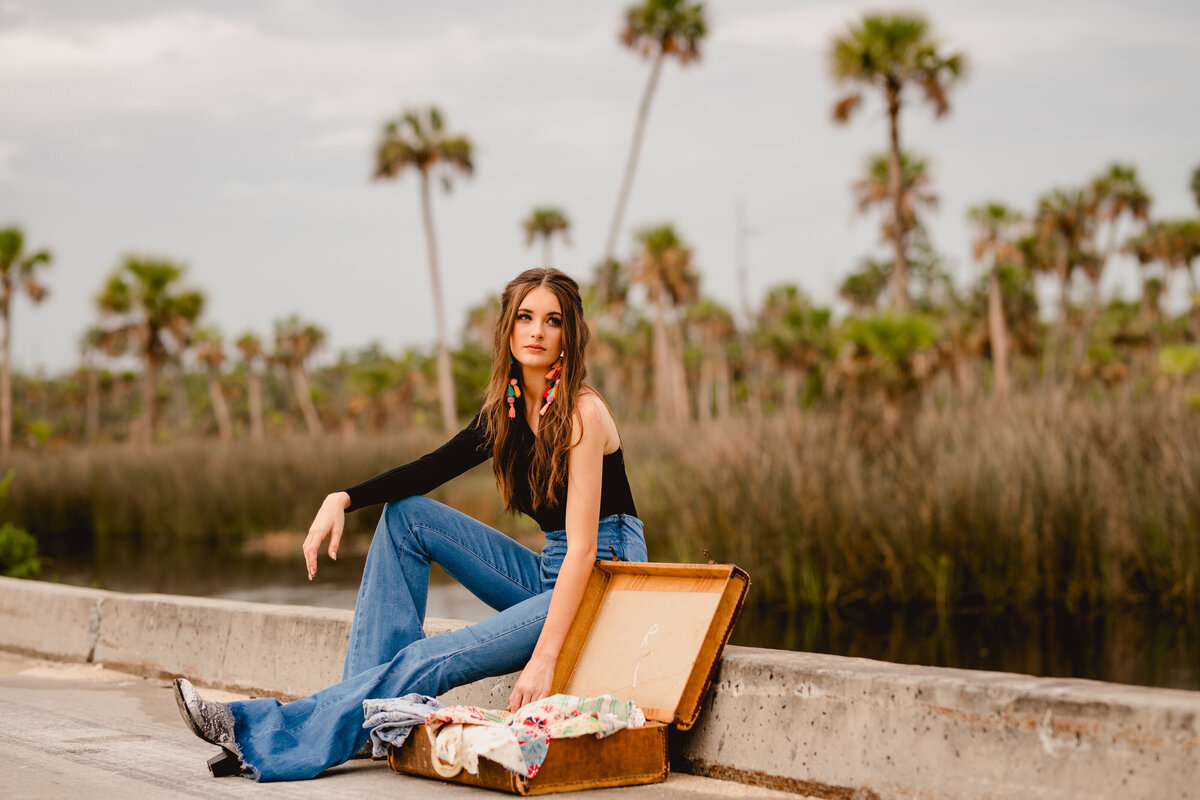 Senior photos with family heirlooms in North FLorida taken by professional senior photographer.