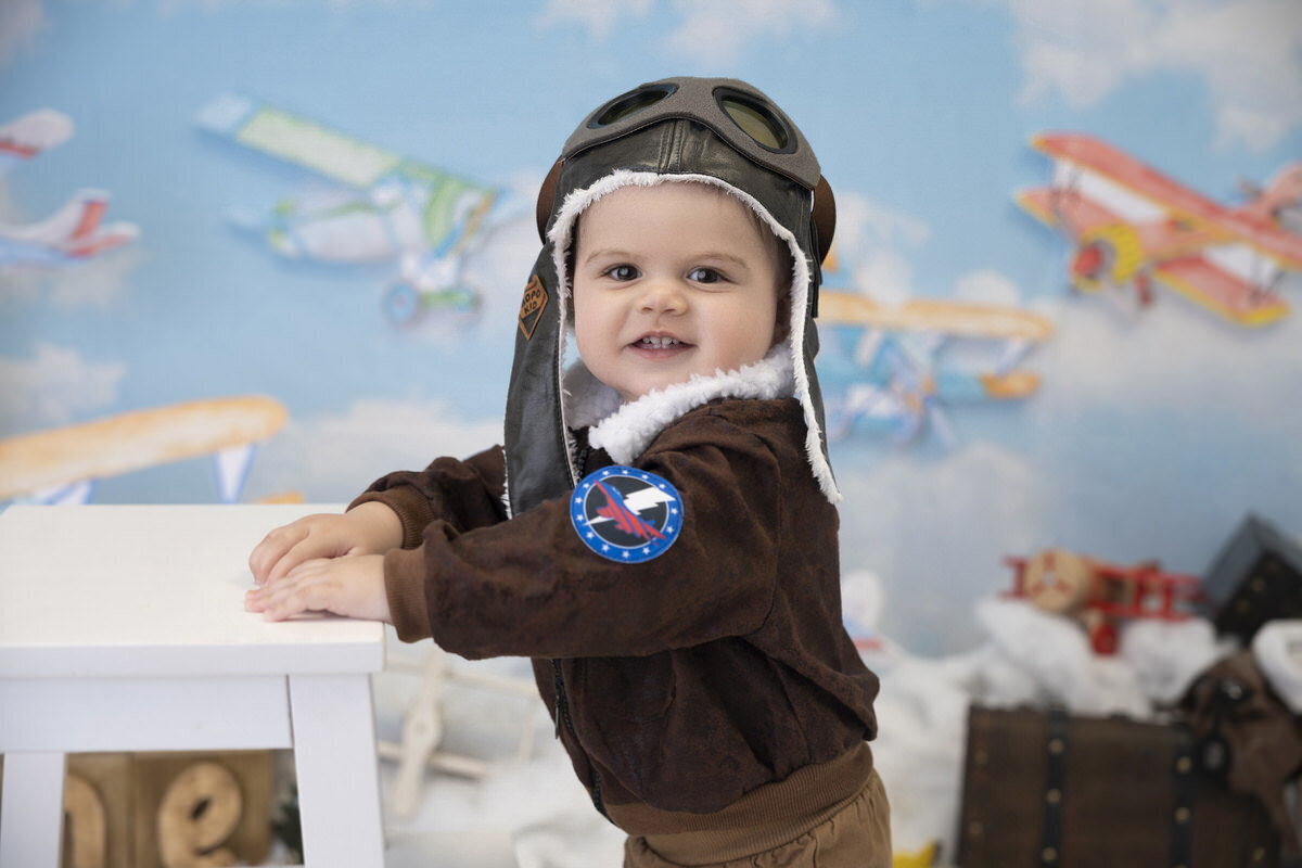 28 aviator themed portrait session toddler