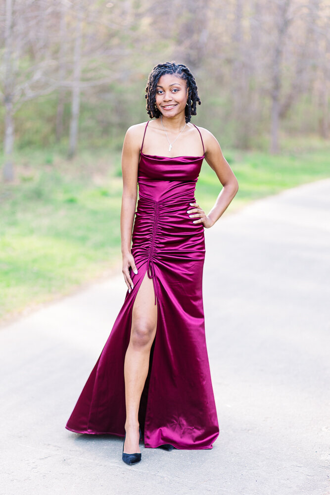 Prom picture of a girl wearing a beautiful long dress at Joyner Park in Wake Forest, NC.