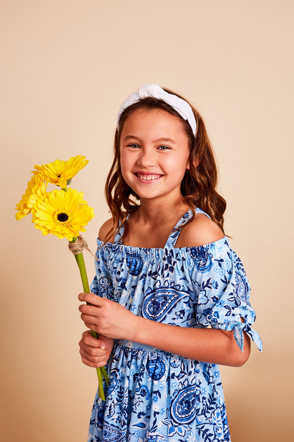 Greer Rivera Photography Kids Editorial Photoshoots Marin Girl in a dress and headband holding a flower