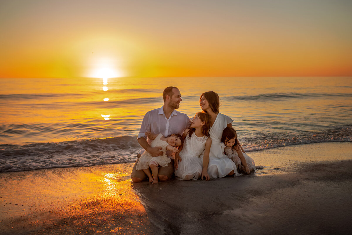 Large family photoshoot in Anna Maria island in Florida during golden hour