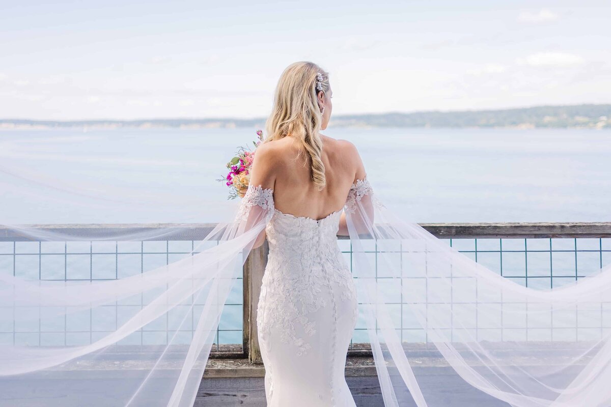 Bride looking off into the distance towards Whidbey Island