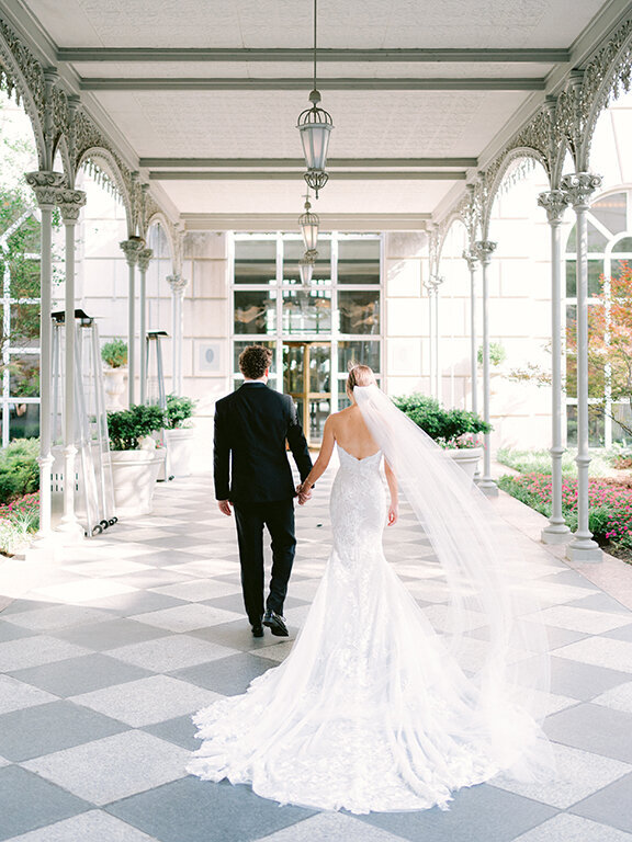 Bride and groom in the grounds of Hotel Crescent Court Dallas