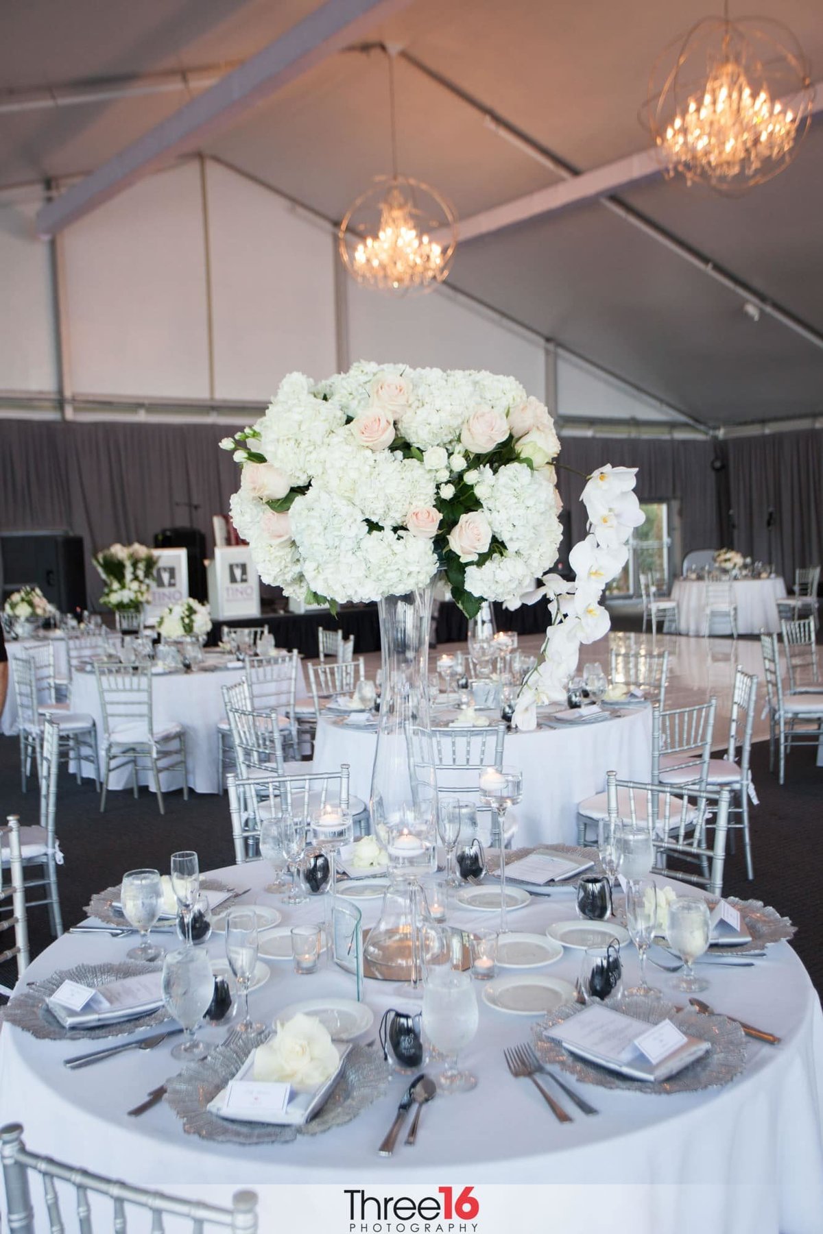 Beautiful wedding reception table setup with large centerpieces