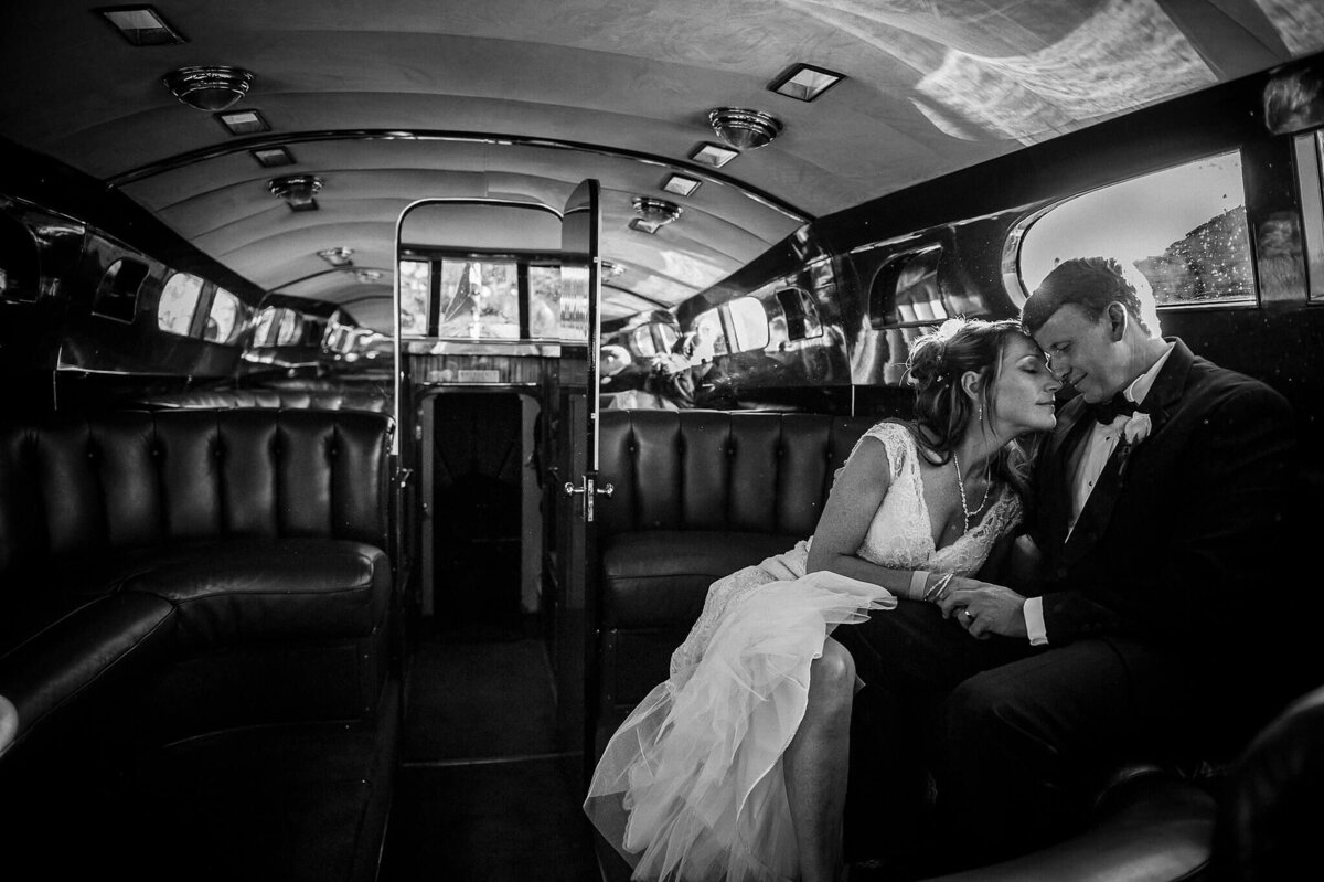 bride and groom having quiet moment in Thunderbird vintage boat