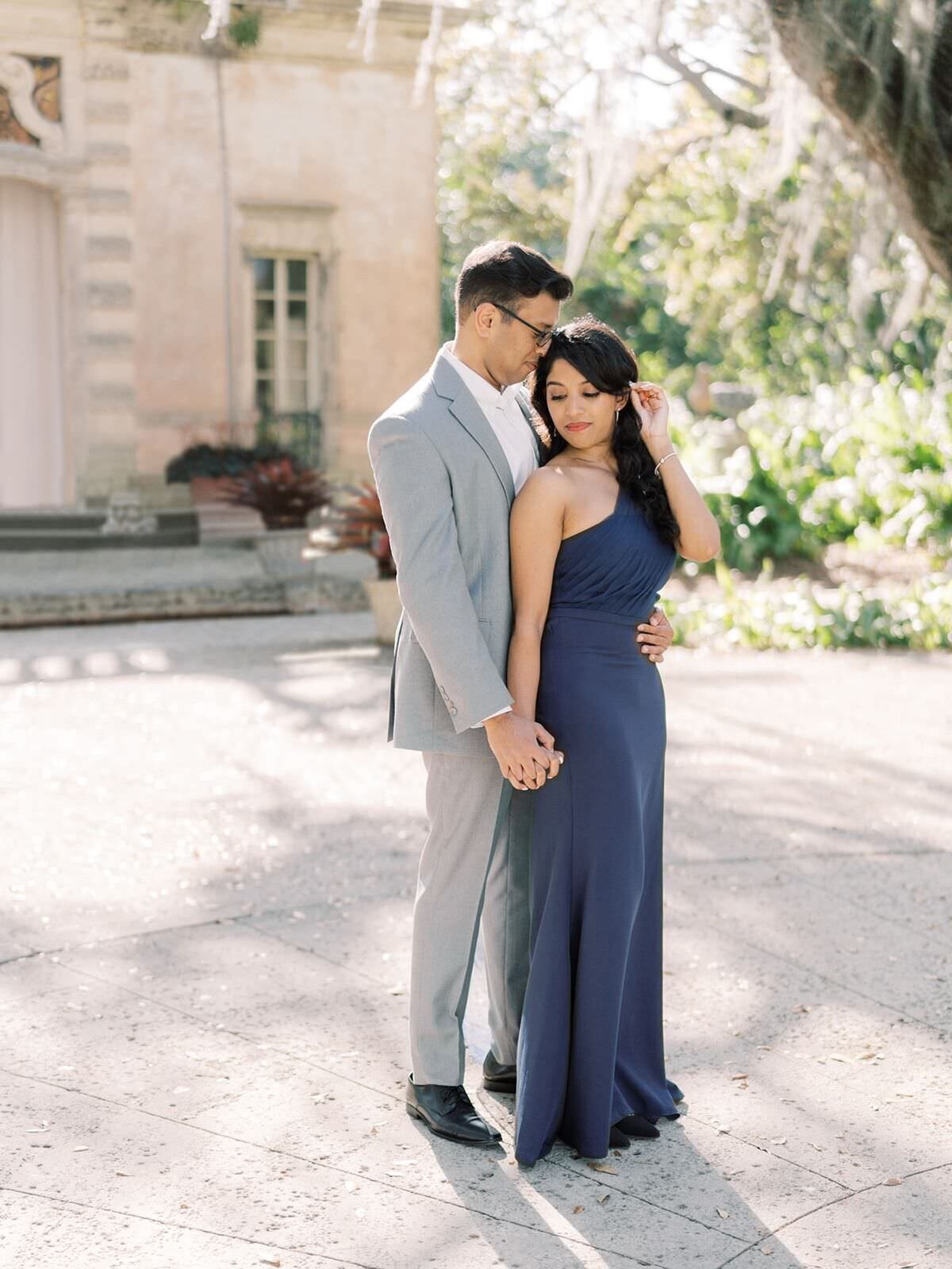 Couple-Snuggling-During-Vizcaya-Engagement-Session-with-Sarah-Sunstrom-Photography