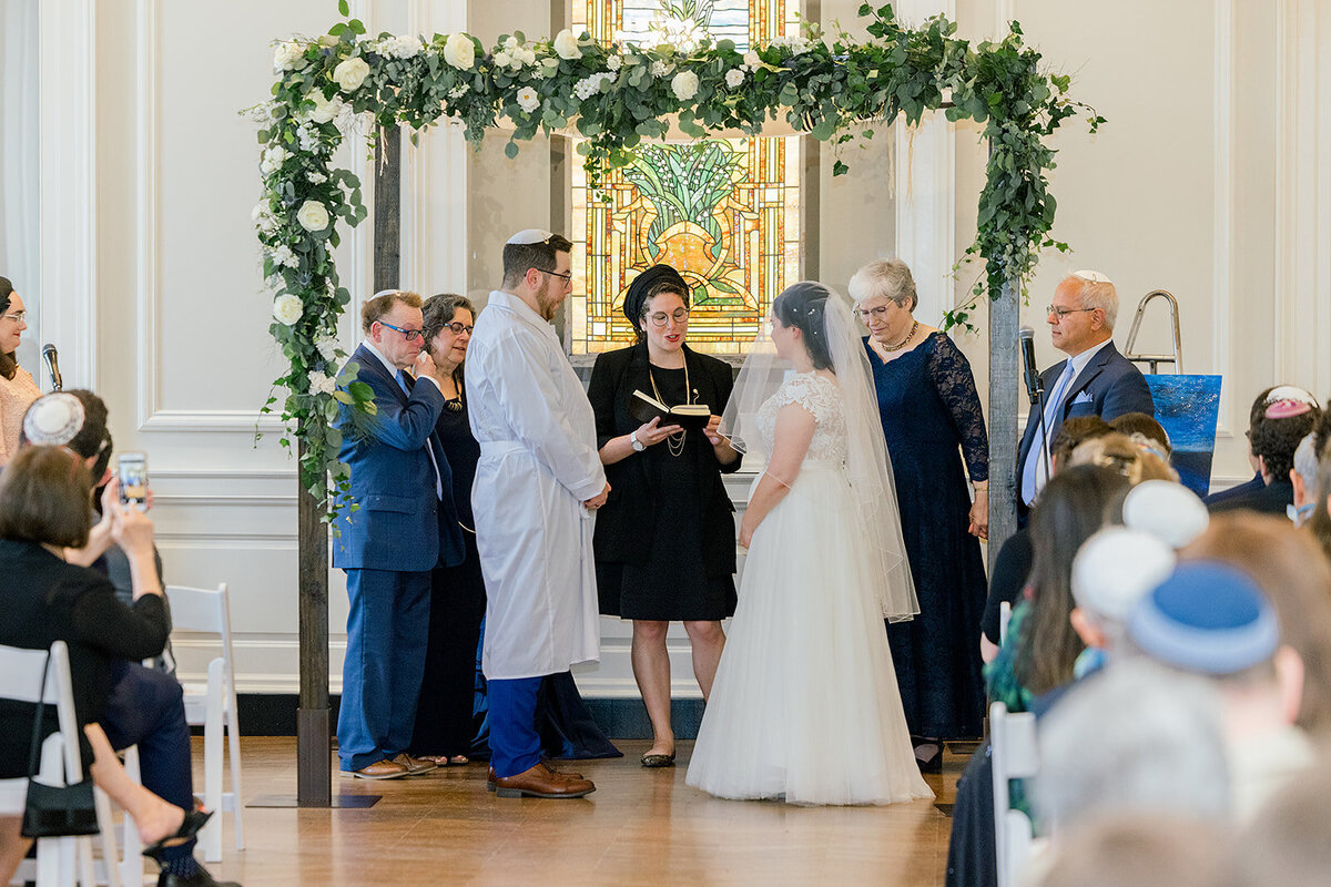 Elegant Jewish Wedding in Chicago with couple under a traditional Jewish Chuppah