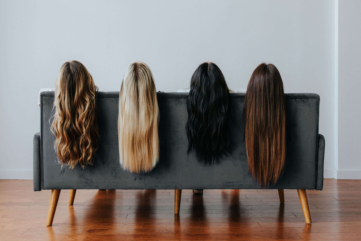 Four girls pose with long hair in an oregon branding photoshoot