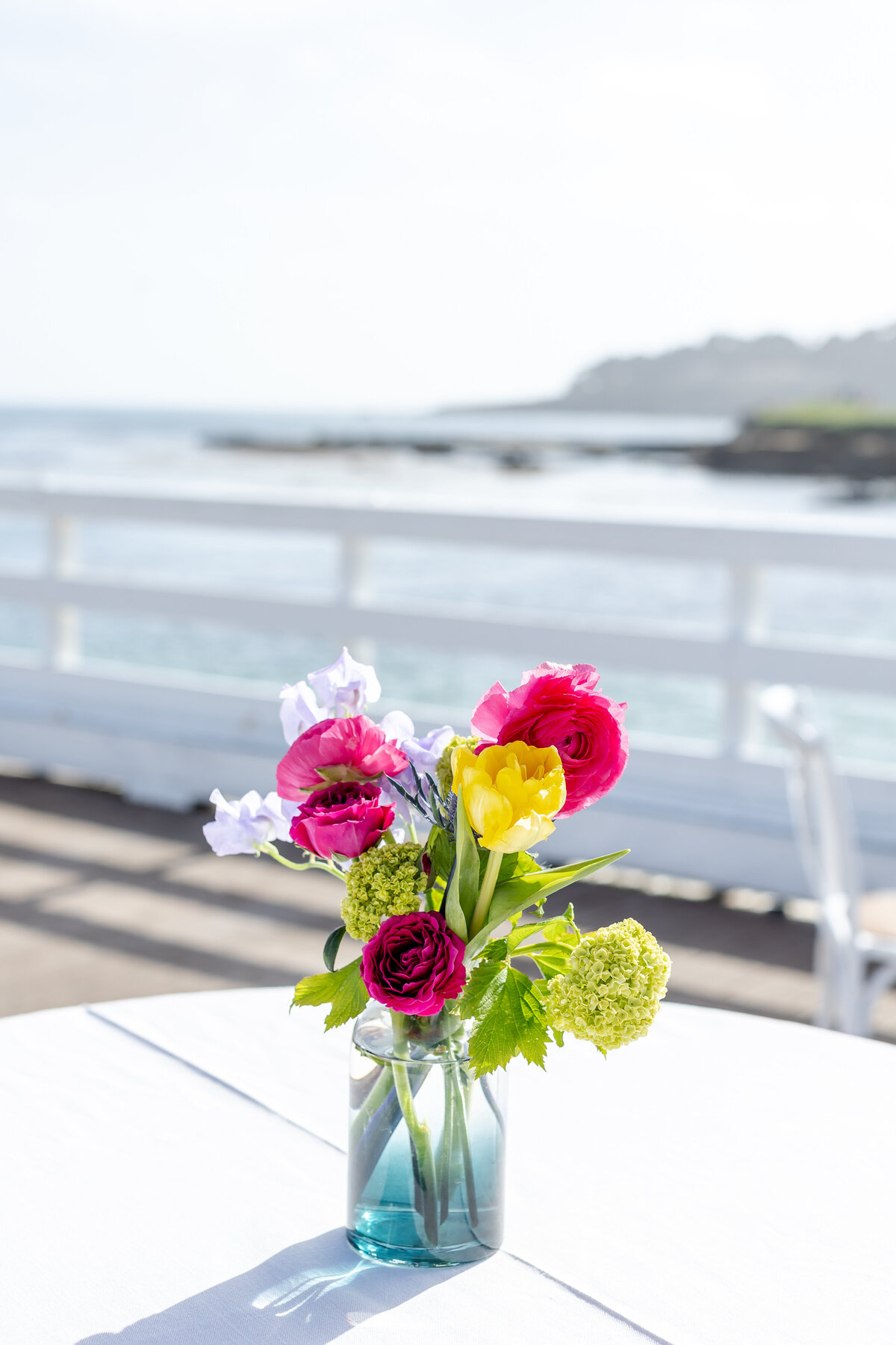 Cocktail hour flowers by the Ocean
