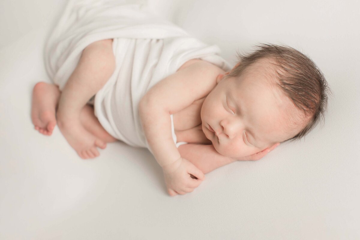 posed baby photo in-home newborn session in Cincinnati