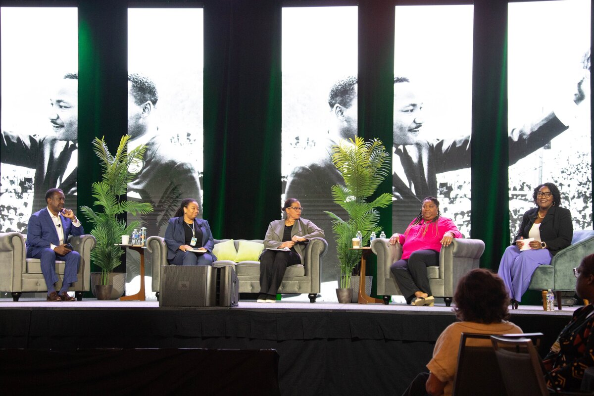 panel discussion with MLK on screens