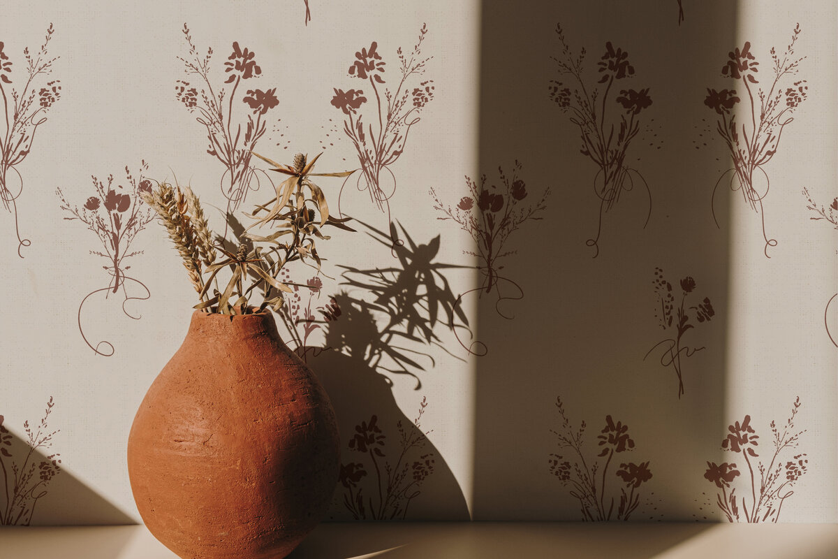 terra cotta vase and wallpaper