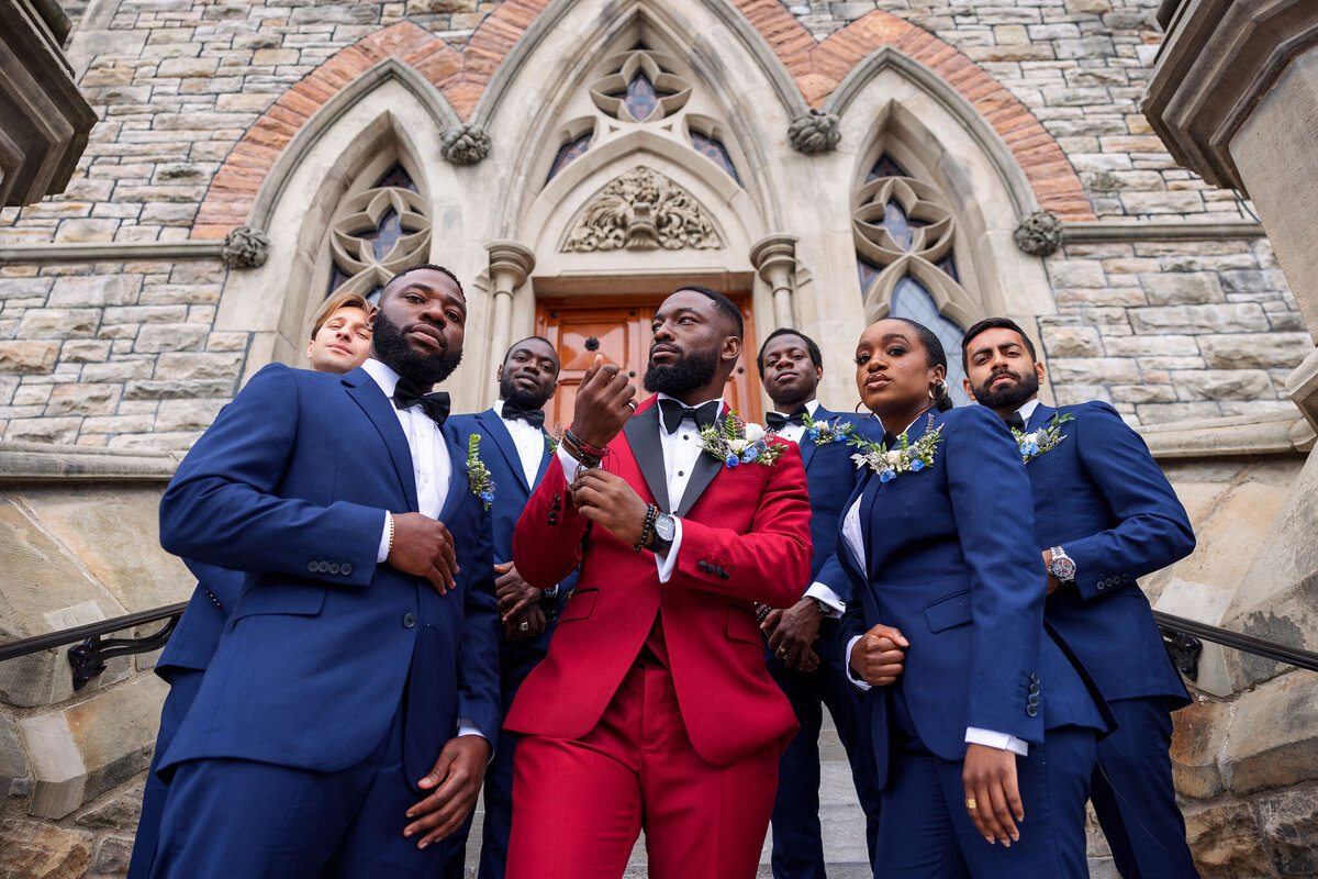 Tomi and Tolu Oruka Events Ziggy on the Lens photographer Wedding event planners Toronto planner African Nigerian Eyitayo Dada Dara Ayoola ottawa convention and event centre pocket flowers Navy blue groom suit ball gown black bride classy  34