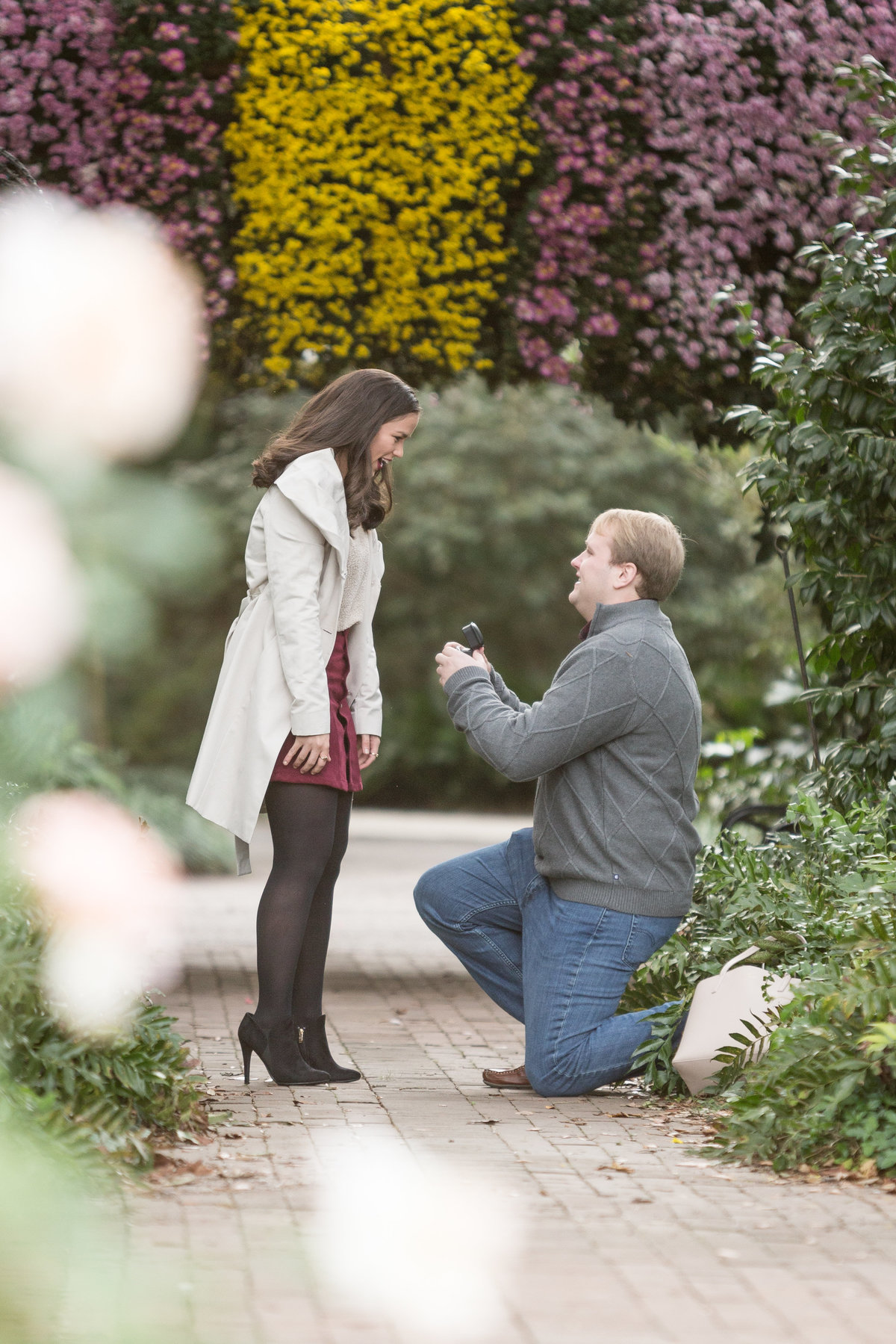 Adam surprises Kristen with an engagement ring at Bellingrath Gardens in Theodore, Alabama.