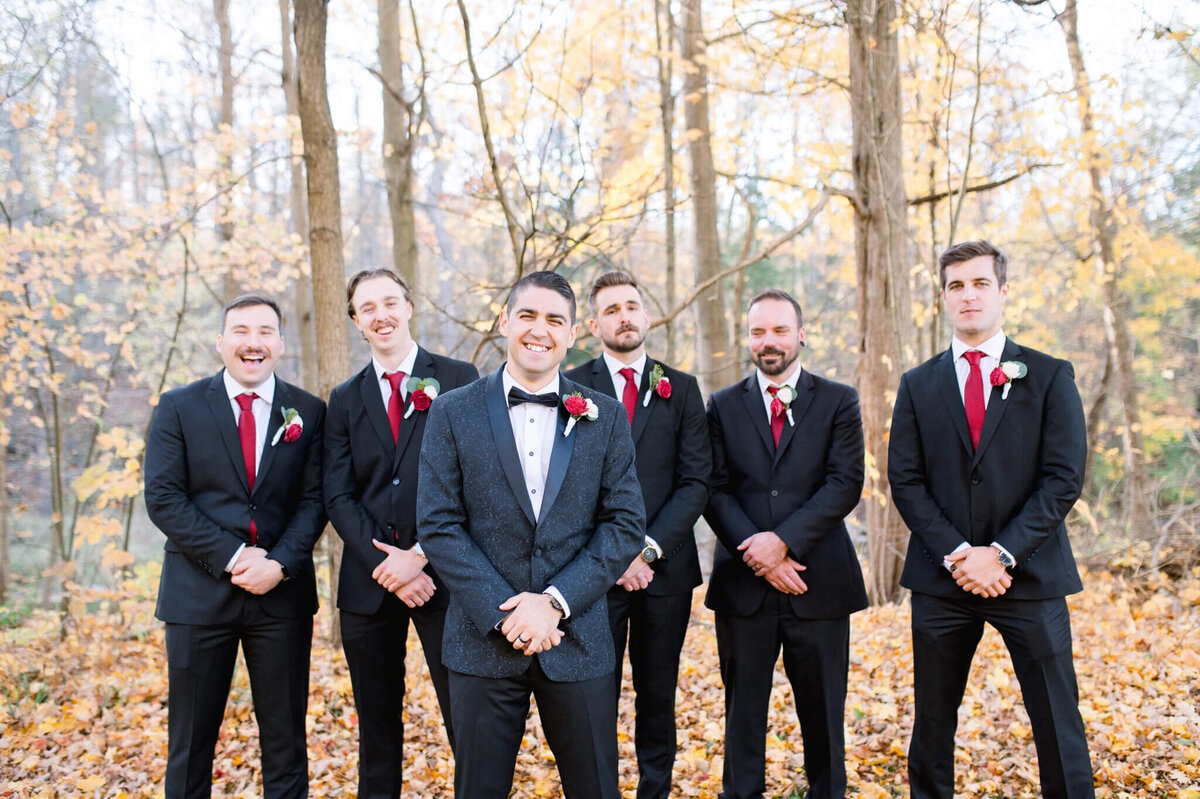 Niagara wedding photography captures groom standing infront of his groomsmen.