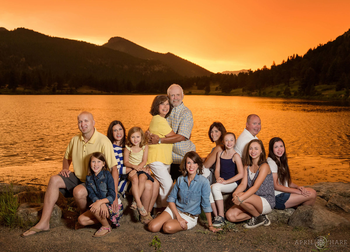 Orange sunset family photo at Lily Lake Rocky Mountain National Park in Estes Park CO