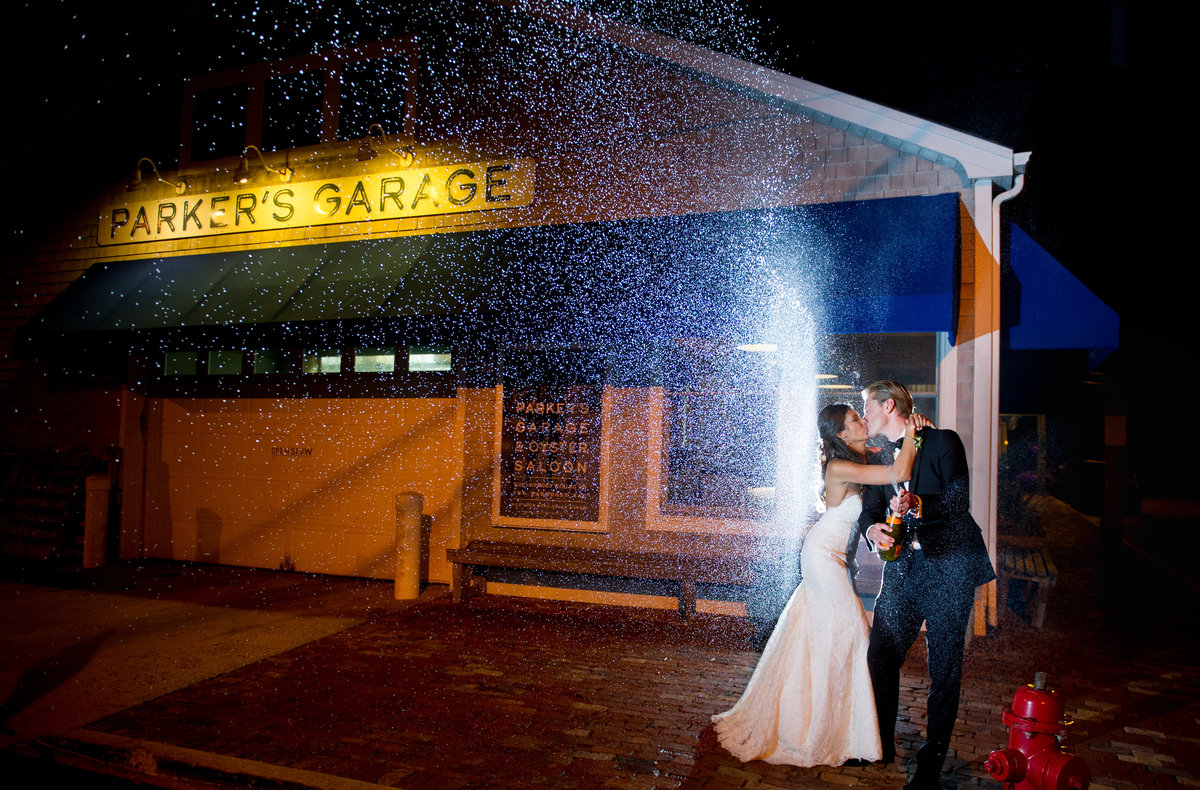 parkers garage wedding photo with champagne