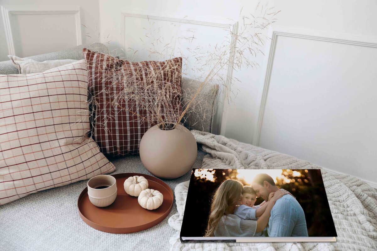 Brisbane-Family-Portrait-Fine-Art-Album-On-Sofa