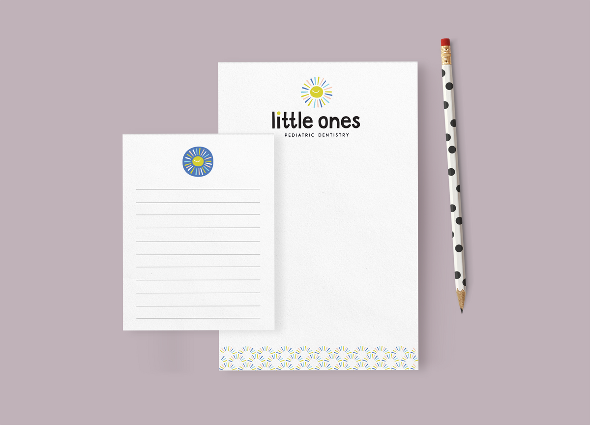 Custom notepad designs for Little Ones Pediatric Dentistry. Brand design by Pace Creative Design Studio