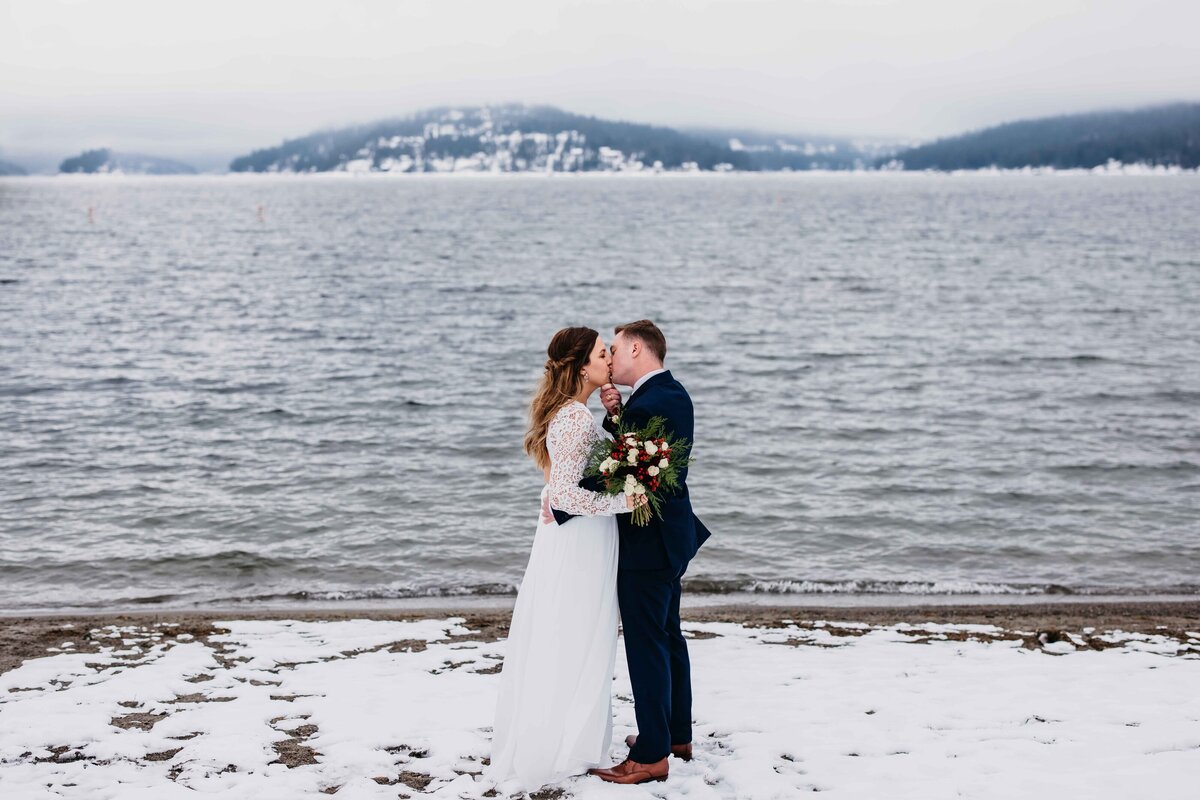 Snow Elopement with Lake and Mountains Winter Wedding Couple in Coeur d'Alene - Clara Jay Photo-2