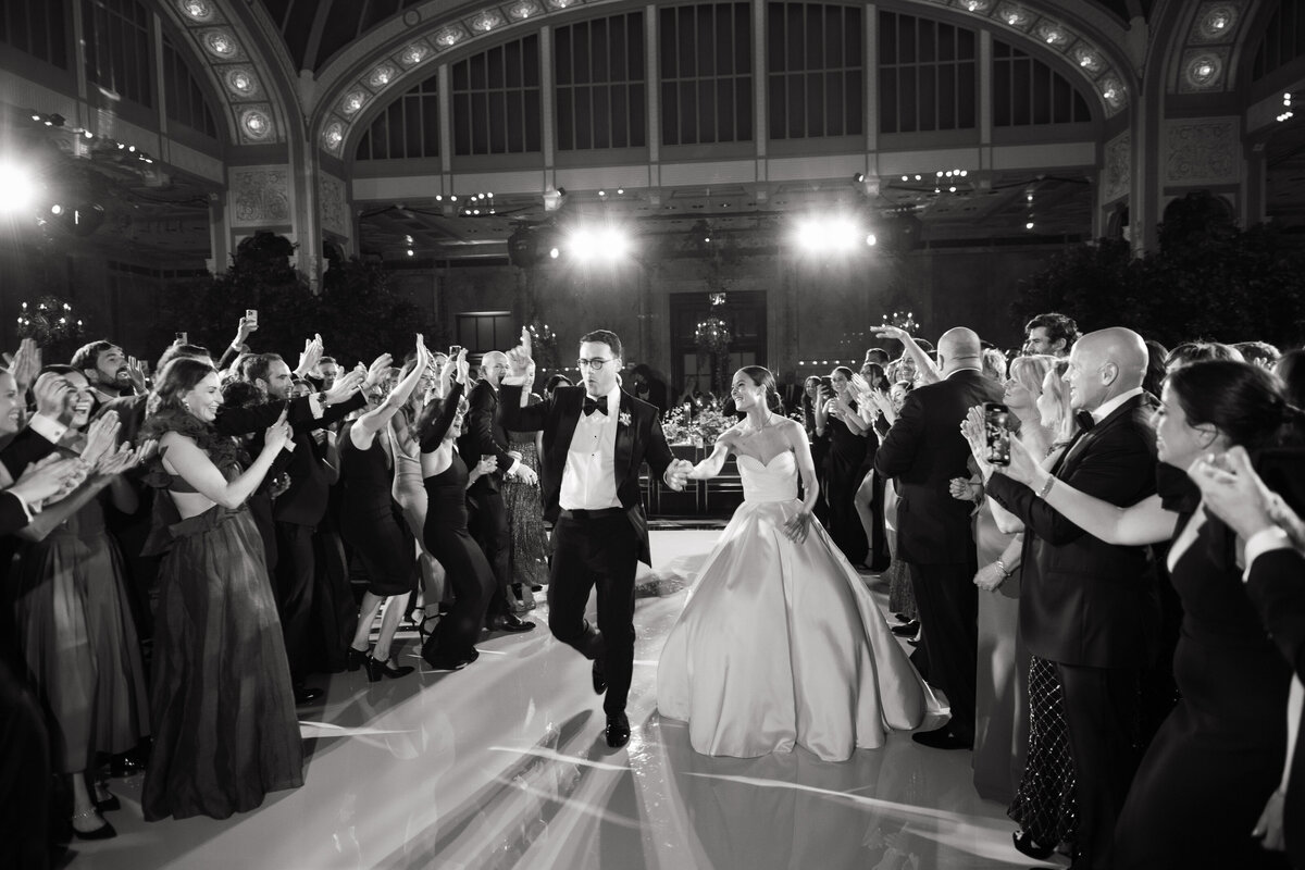 Wedding couple entering reception at the NY public library