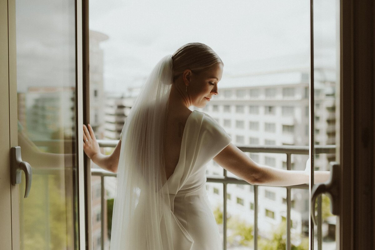 Event-Planning-DC-Wedding-Westin-Georgetown-Hotel-jewelsy-photography-bride-window-looking-down