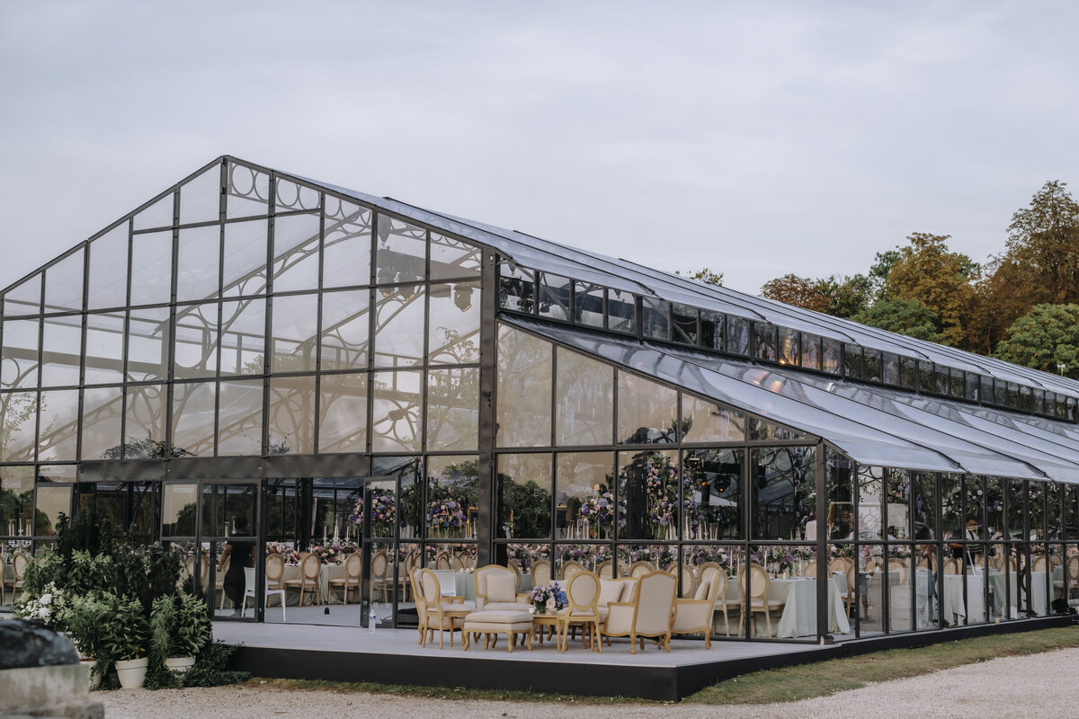 Paris Destination Wedding at Chateau de Chantilly by Alejandra Poupel Events horizontal-dinner area from outside 