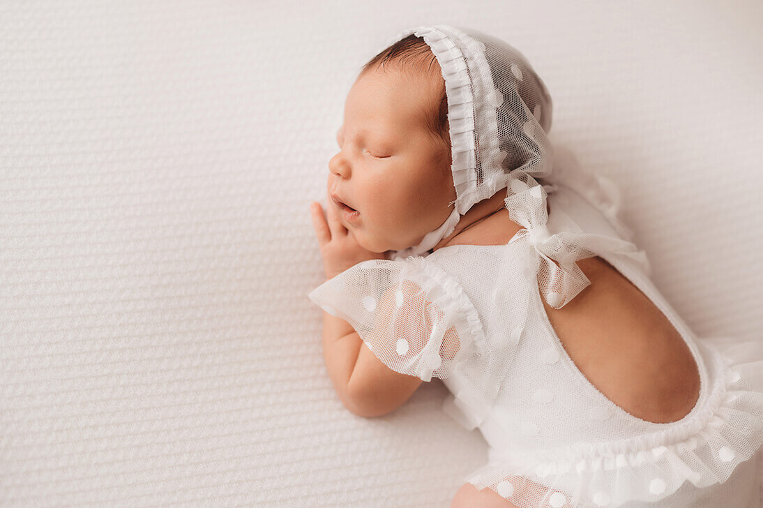 Infant posed for Newborn Portrait Session in Asheville, NC.