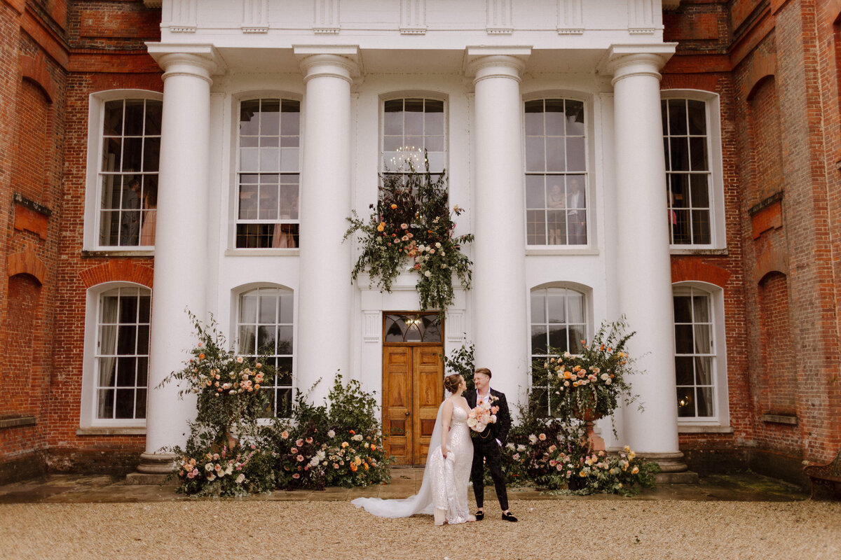 floral-installation-building-exterior-uk-destination-wedding