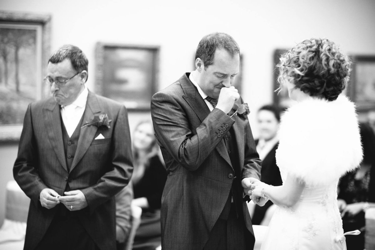 emotional groom in wedding ceremony