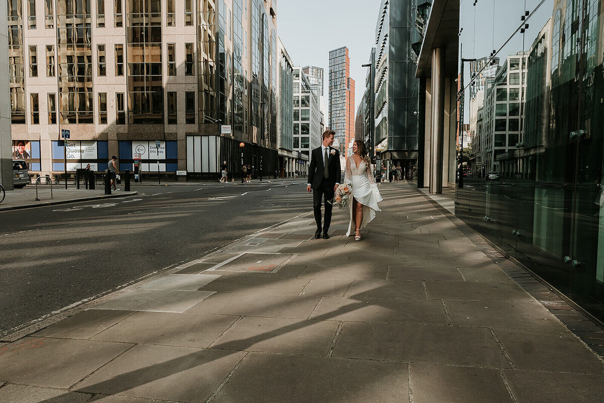 London wedding photography bride and groom walking