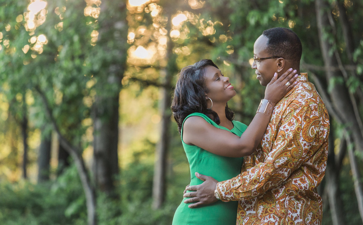 charlotte engagement photographer jamie lucido creates a beautiful engagement portrait in the woods at sunset