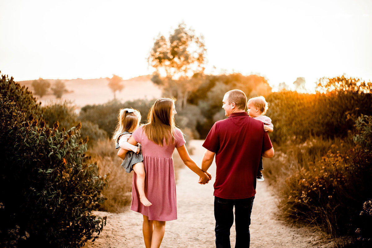 San diego-family-photographer-near me-holding hands-kids-trail