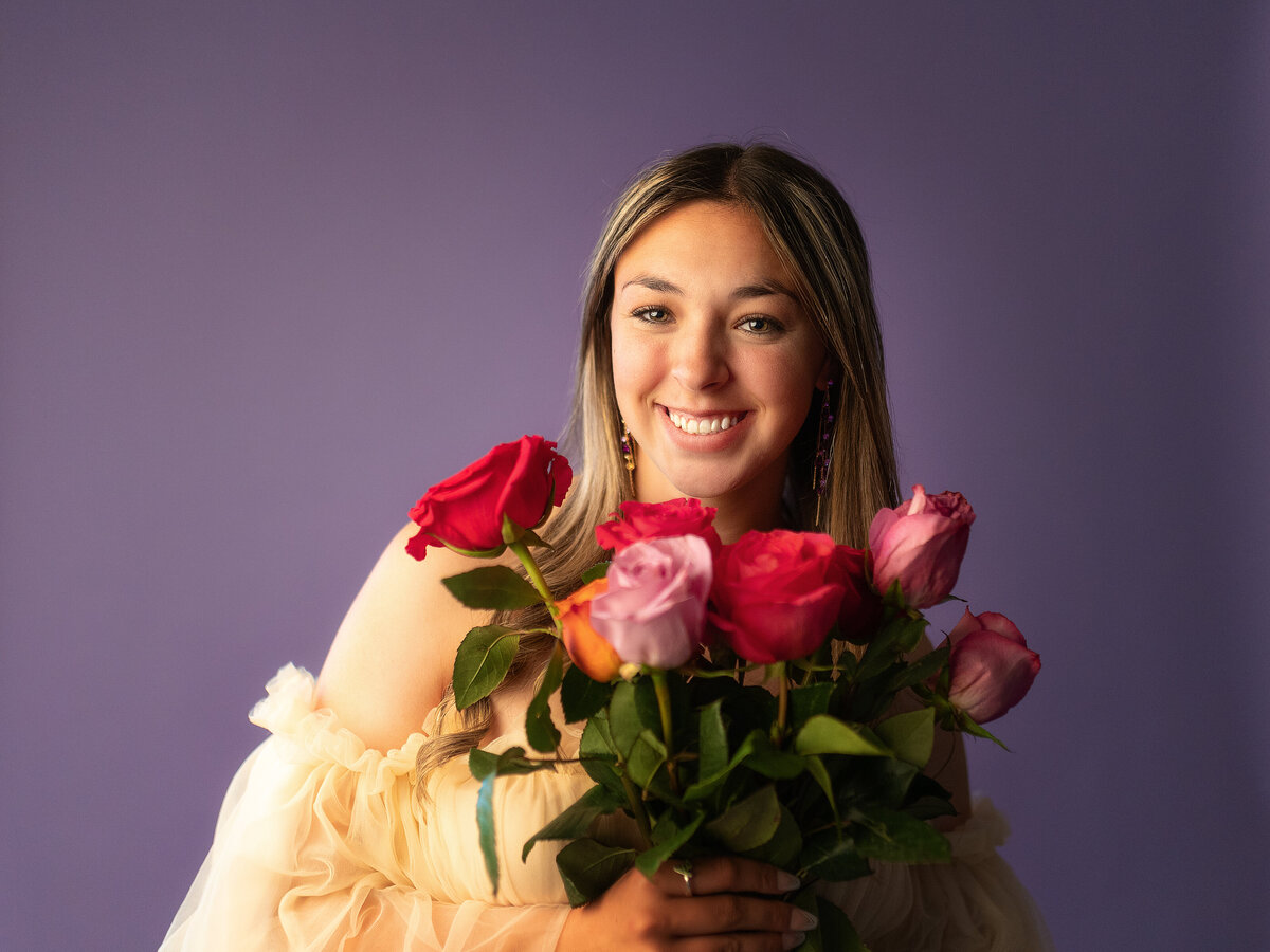 girl in studio with fresh flowers