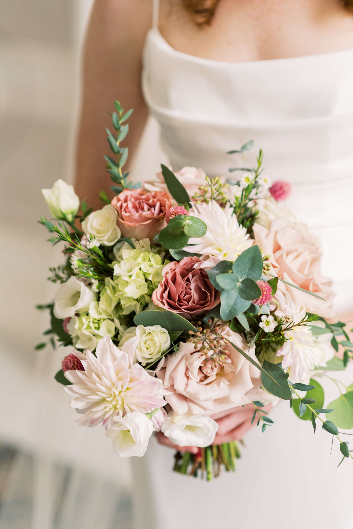 Wedding florals in dusty pink, ivory and greenery at Lord Nelson Hotel wedding in Nova Scotia