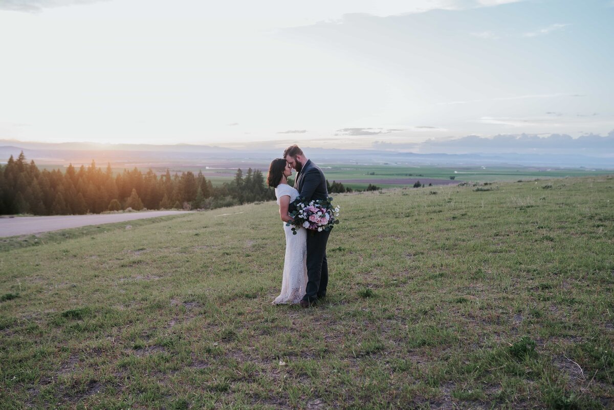 Lake Tahoe wedding photographer captures couple kissing after beach wedding