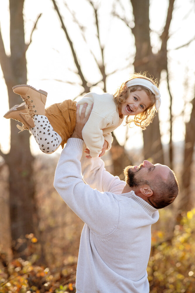 Family session of little girl and her dad outside