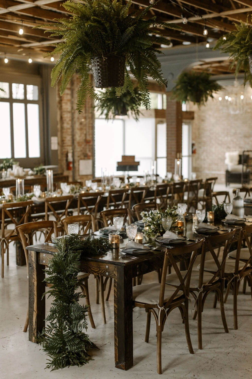 Romantic wedding reception at the St Vrain with candles and greenery
