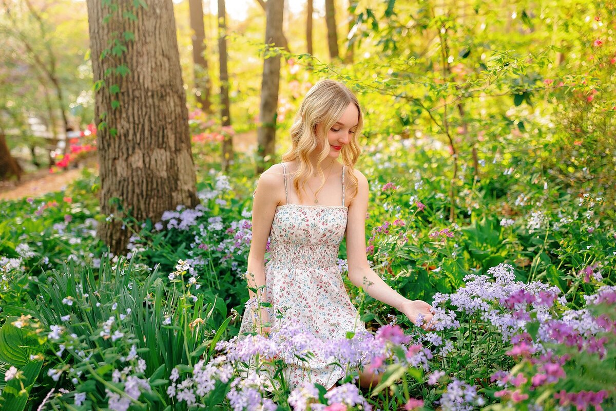 Senior photography session with colorful flowers