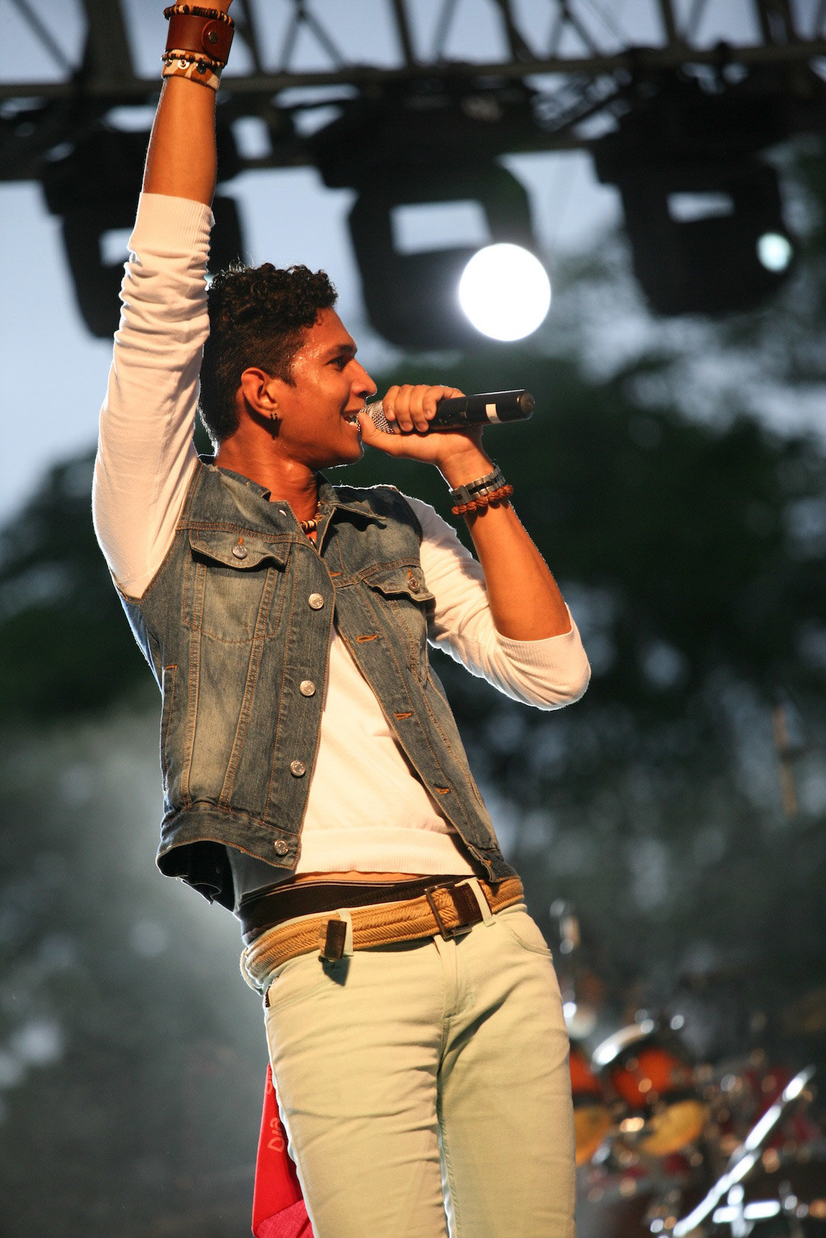 Image of young Trinidadian singer, Christian Kalpee, on stage. Photo by Ross Photography, Trinidad, W.I..