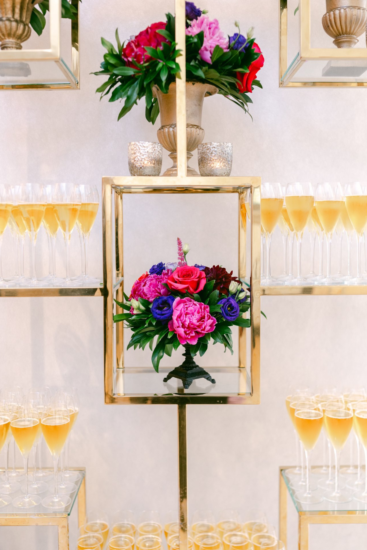 secret-garden-wedding-reception-greenery-pink-purple-gold-champagne-display