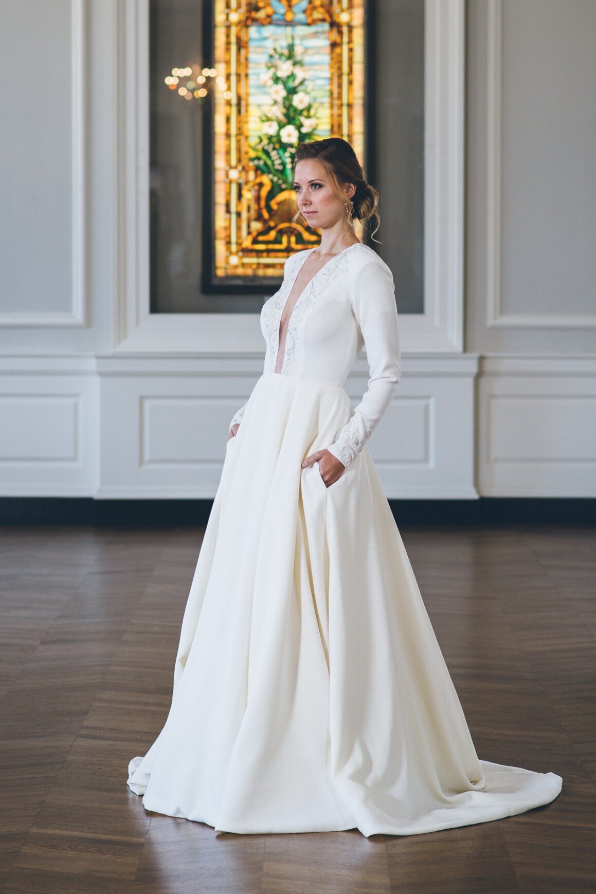 Iman is a long sleeve wedding dress in a ballgown silhouette by indie bridal designer Edith Elan.