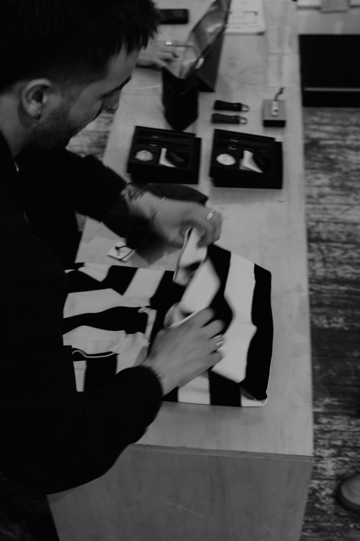 Stripe tshirt being folded at the P&co Pop Up Store in Shoreditch