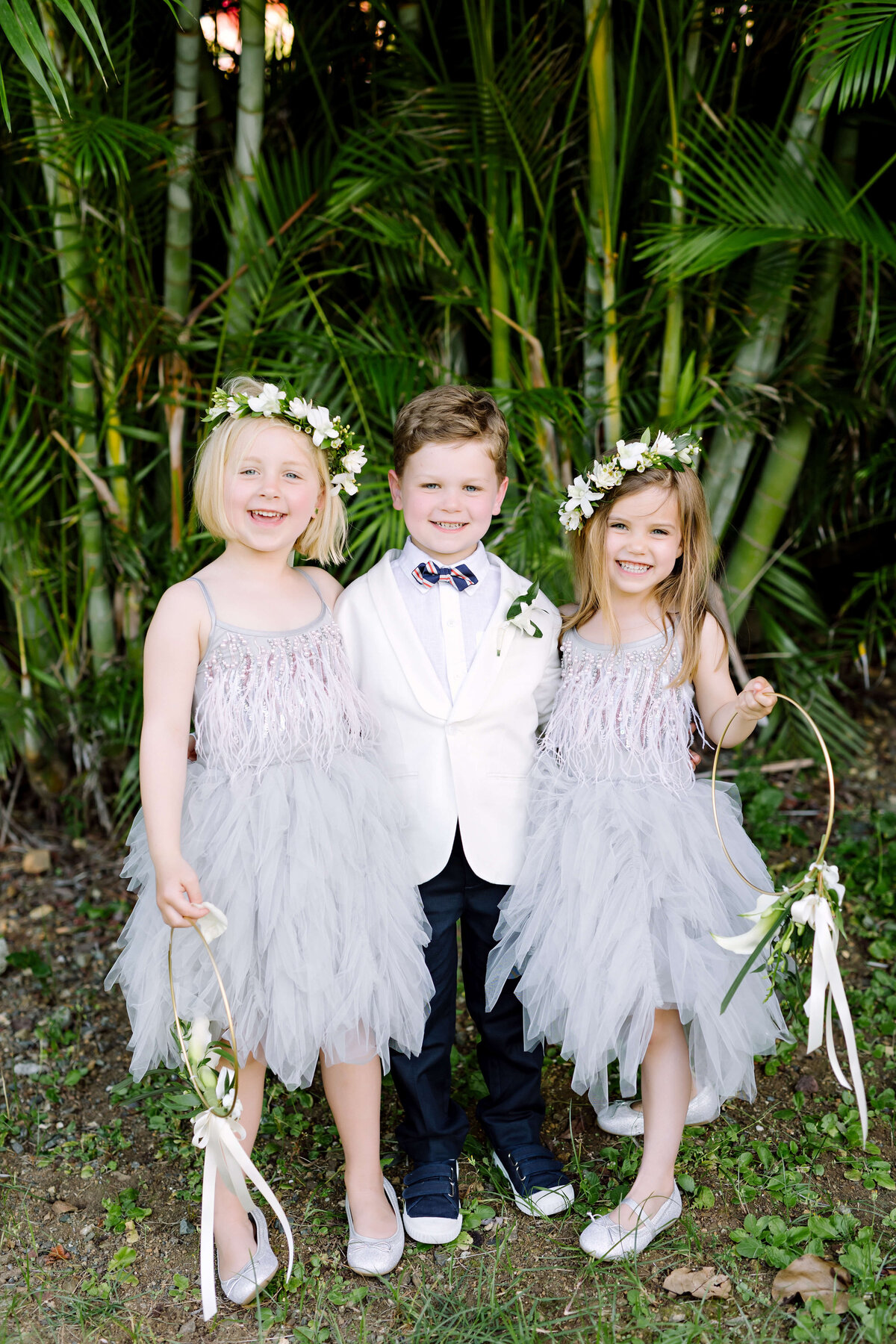 flower girls and ring bearer in white and blue