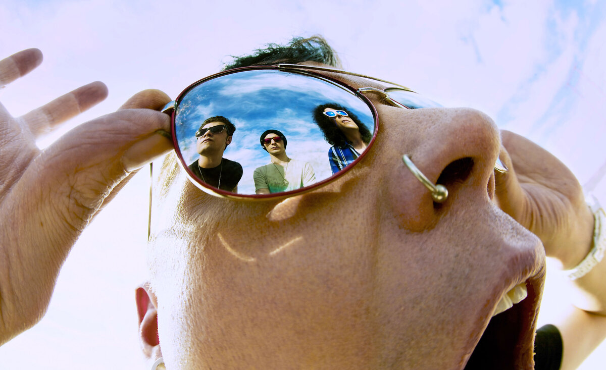 Rock band portrait Faber Drive close up singer with band reflection in sunglasses