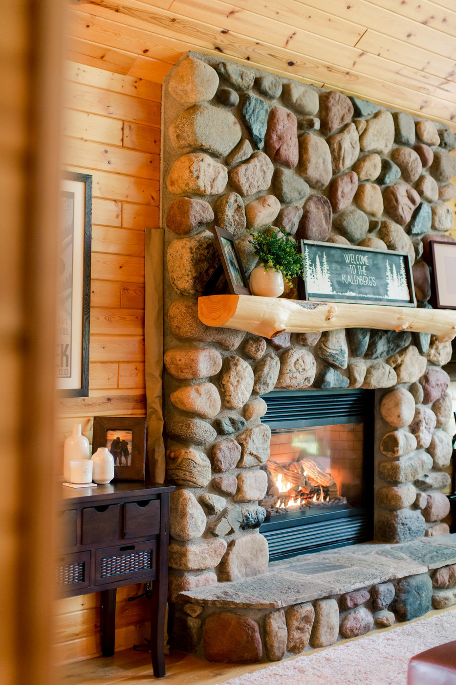 wooden cabin and stone fireplace on gull lake
